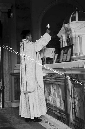 CHAN-REV.ALBERT-S.J. AT ALTAR EMO AFTER IST MASS